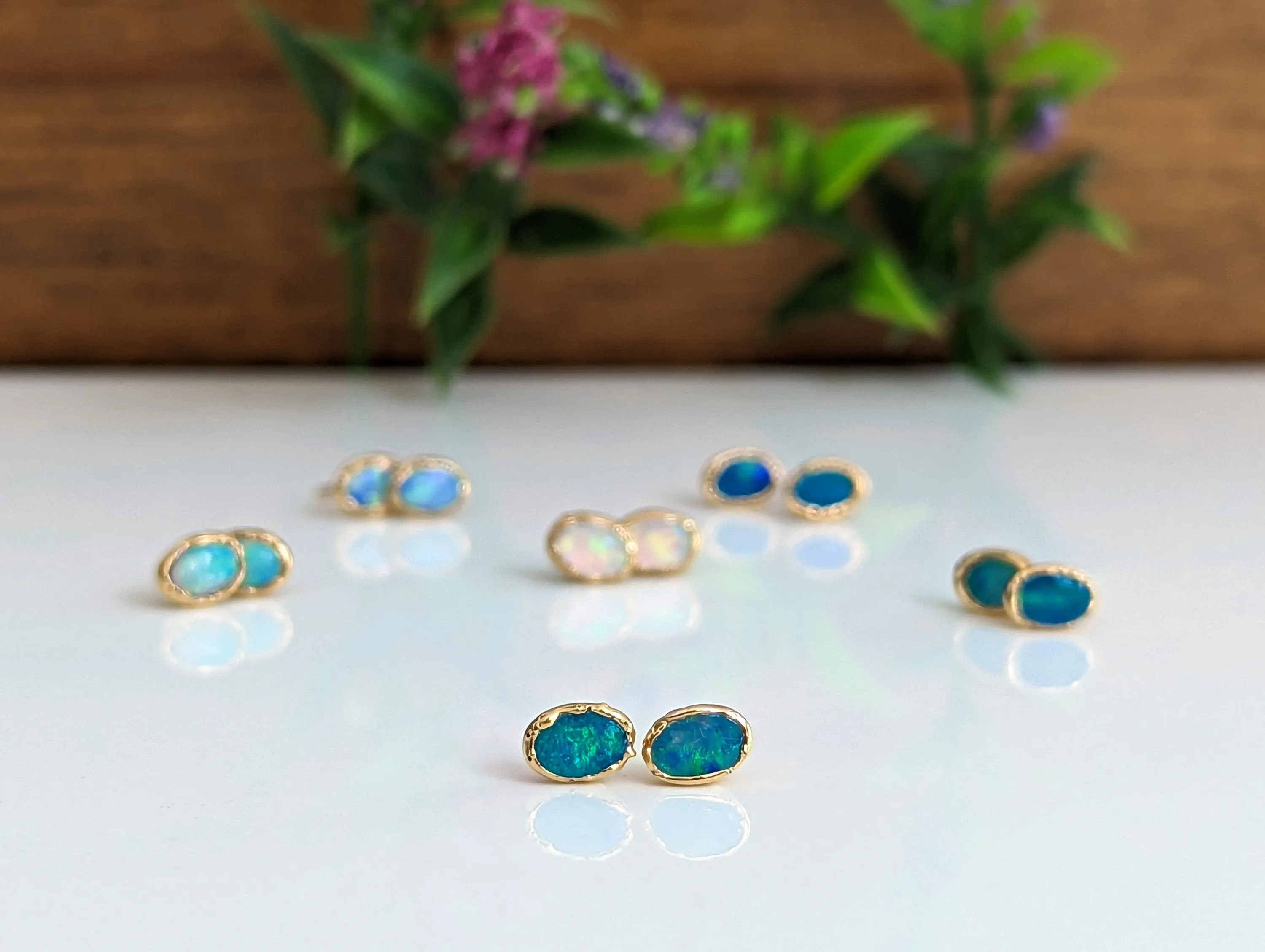 Blue Australian Opal stud earrings in 18k Gold